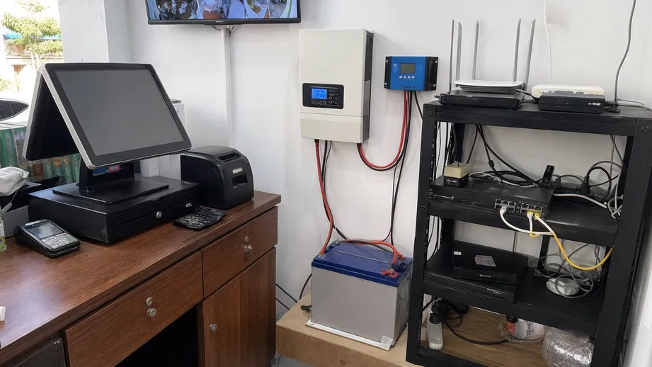 12V solar UPS battery system protecting POS terminals and networking equipment in a small business