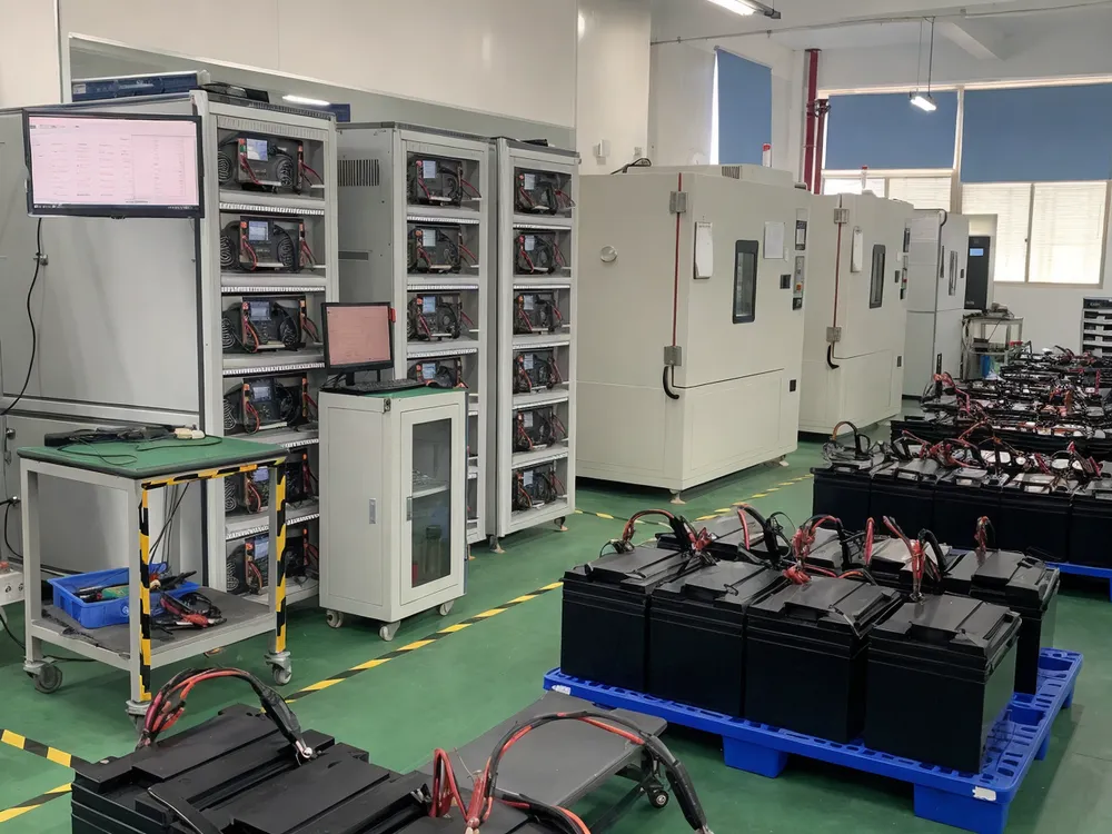 Battery lifecycle testing equipment running capacity verification and temperature soak tests on 12V LiFePO4 production batch