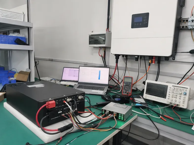BMS protocol bench testing setup with inverter and battery module connected for communication validation