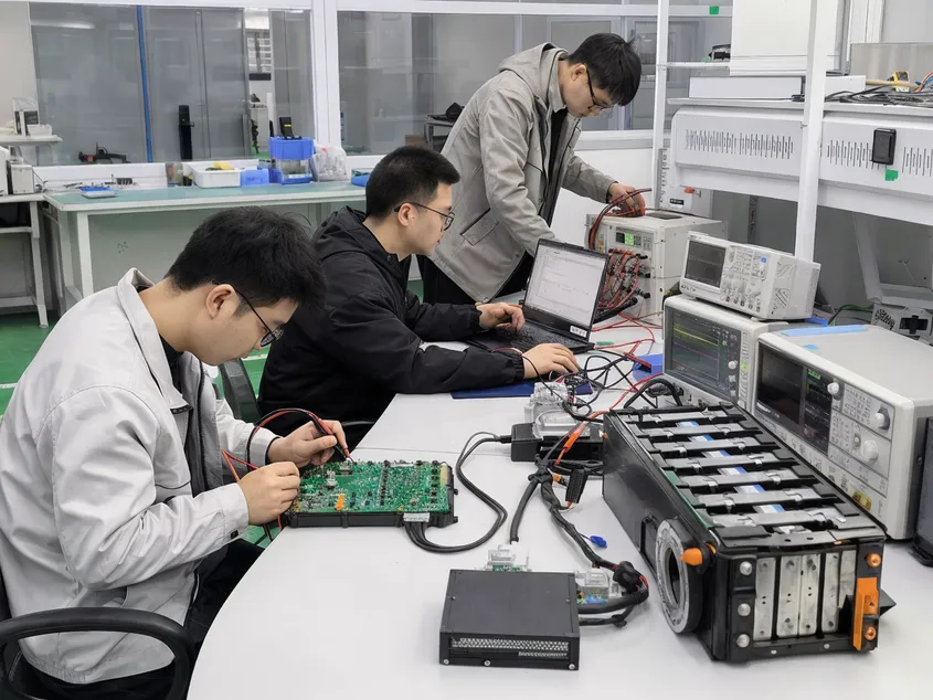EVANBattery BMS and inverter communication testing lab with CAN bus protocol validation equipment