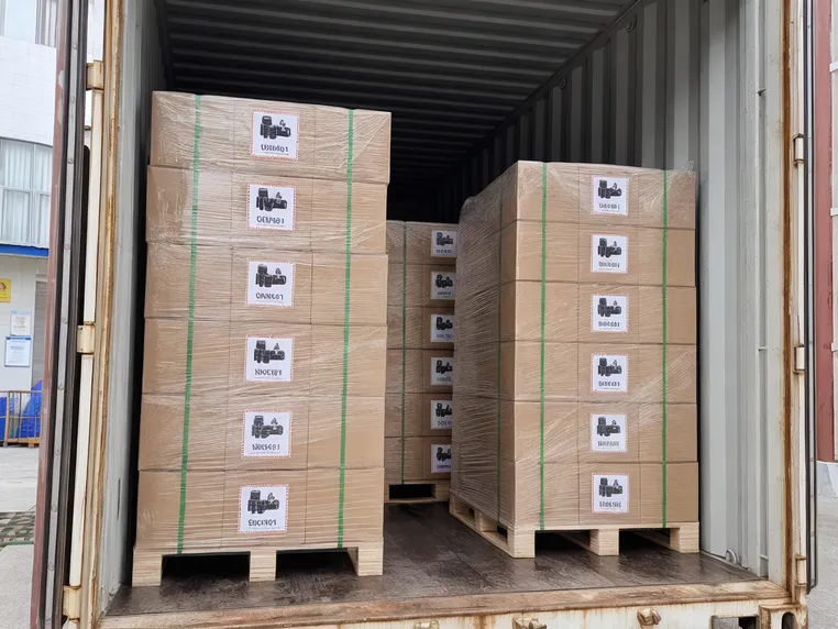 Lithium solar battery cartons palletized and loaded into shipping container with UN3481 labels visible