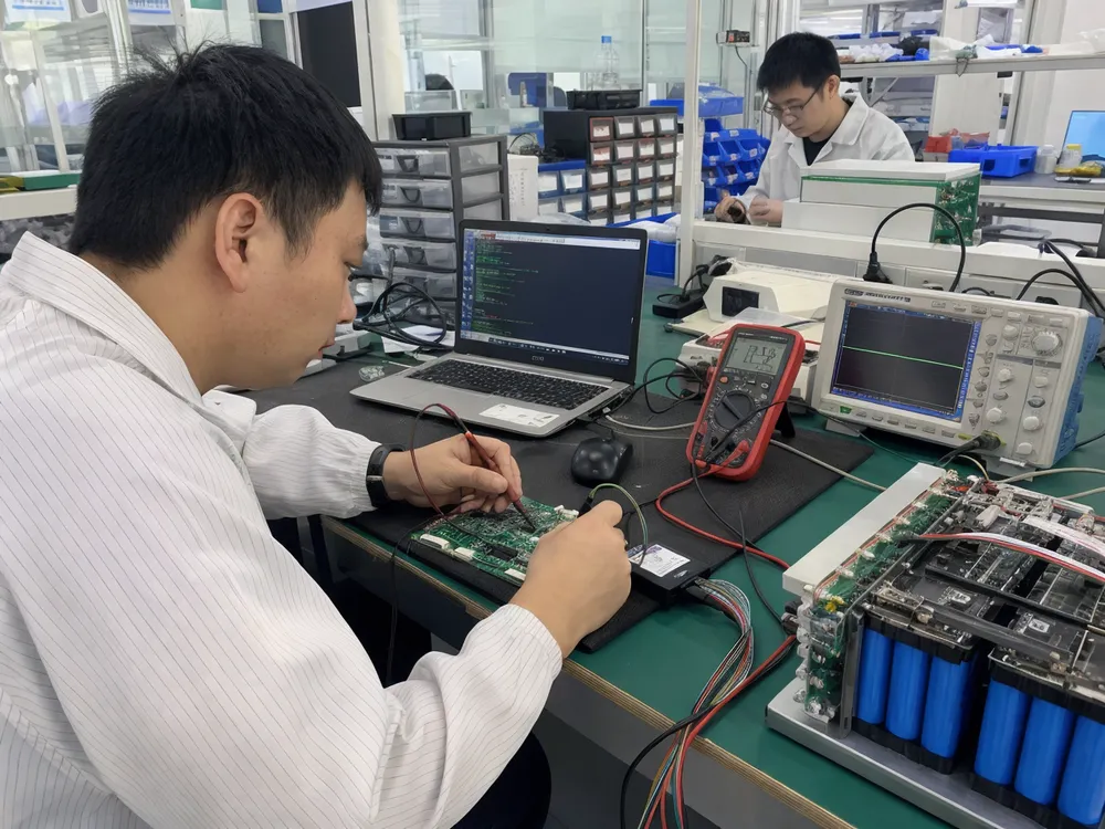 In-house BMS board design and firmware programming for solar battery packs