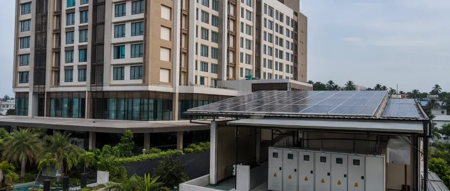 Multi-story hotel building with three-phase battery backup system