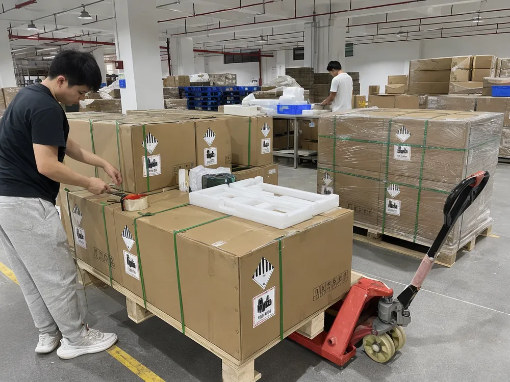 Battery export packing and palletization at Zhongshan factory with Class 9 hazmat labeling